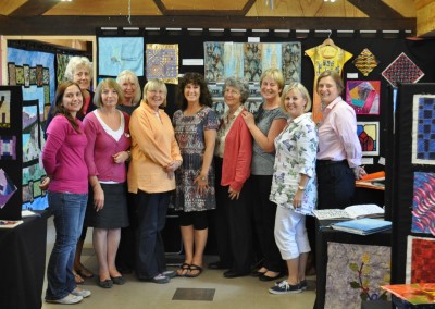 2013 C&G exhibition at Midsomer. L-R some of the students -Nik, Sheila, Barbara F, Catherine, Barbara S, Lynne, Sue, Judy, Julia, Gillian